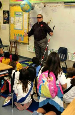 classroom of people discussing disabilities